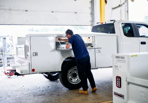 Man working on the back of a truck 